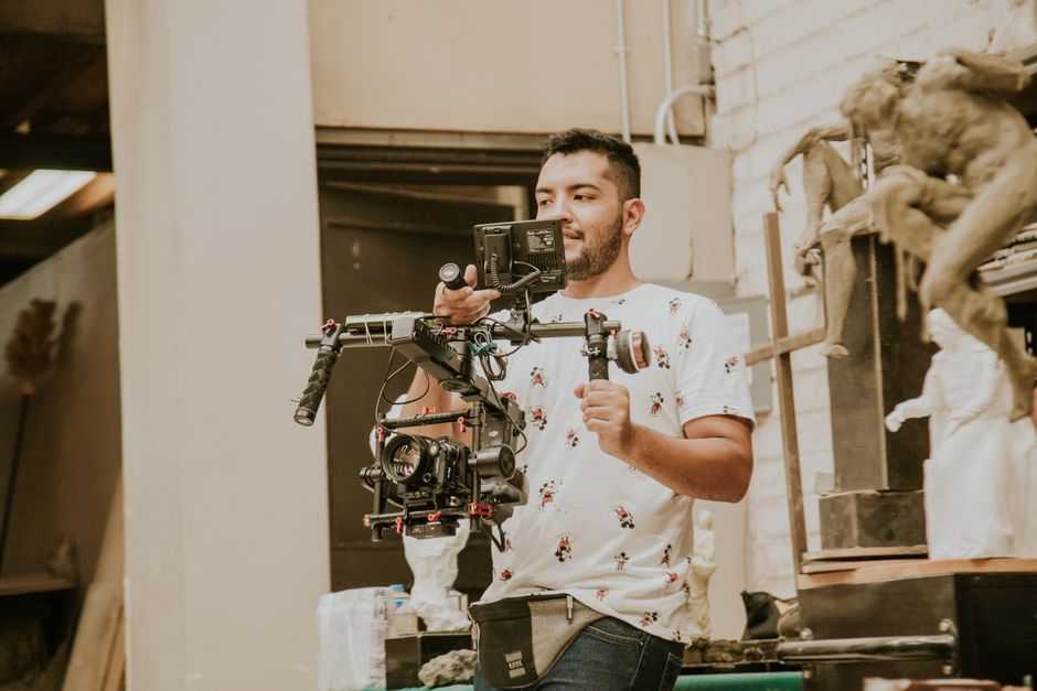Wedding videographer capturing a moment