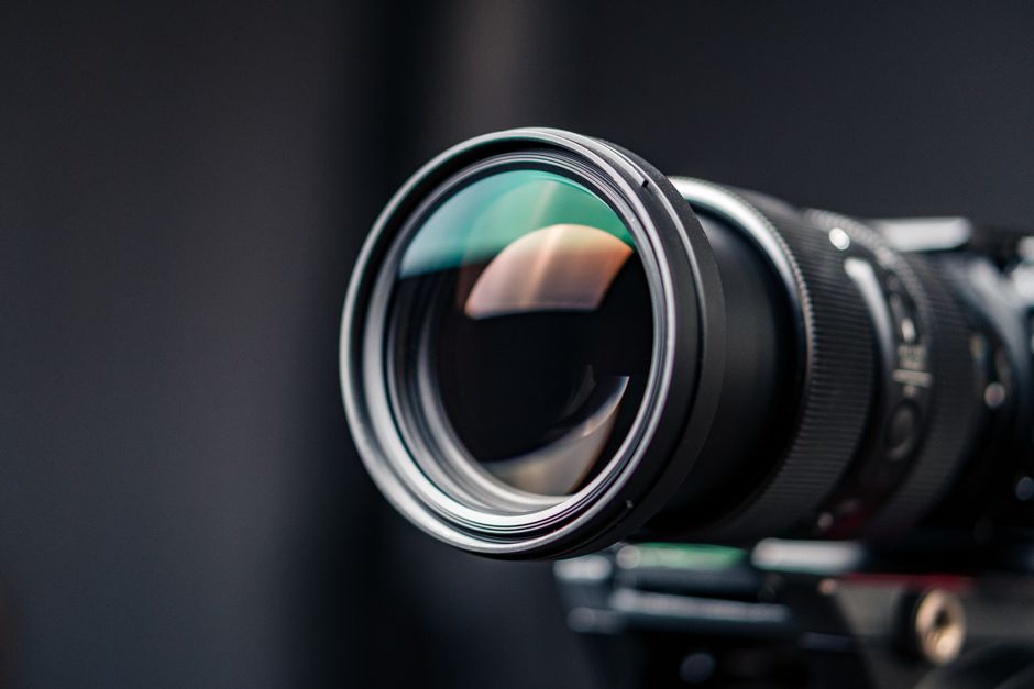 Professional camera lens recording an event